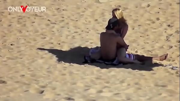 Young Adult Couple in a Risky Beach Voyeur Scene